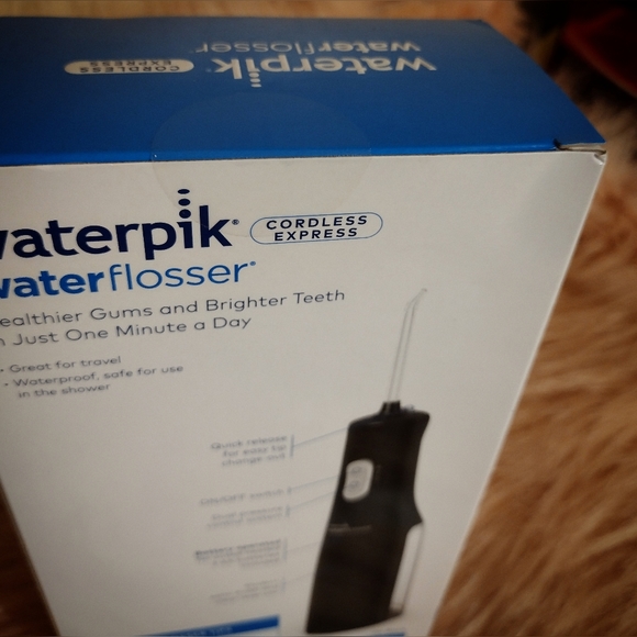 Waterpik Cordless Express Portable Water Flosser Oral Irrigator, Black - Picture 3 of 11